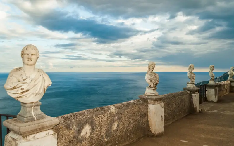 Marble busts on the Terrace of Infinity at Villa Cimbrone, overlooking the Gulf of Salerno