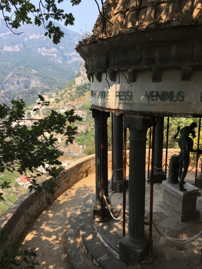The Temple of Bacchus in the Villa Cimbrone gardens, with the valley and mountains behind